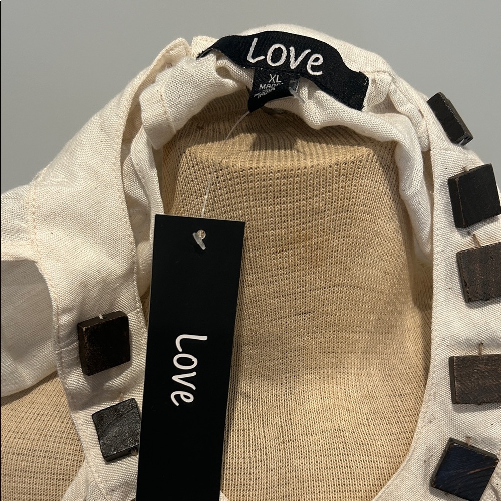 Off White Sleeveless Dress with Accents - Picture 2 of 3